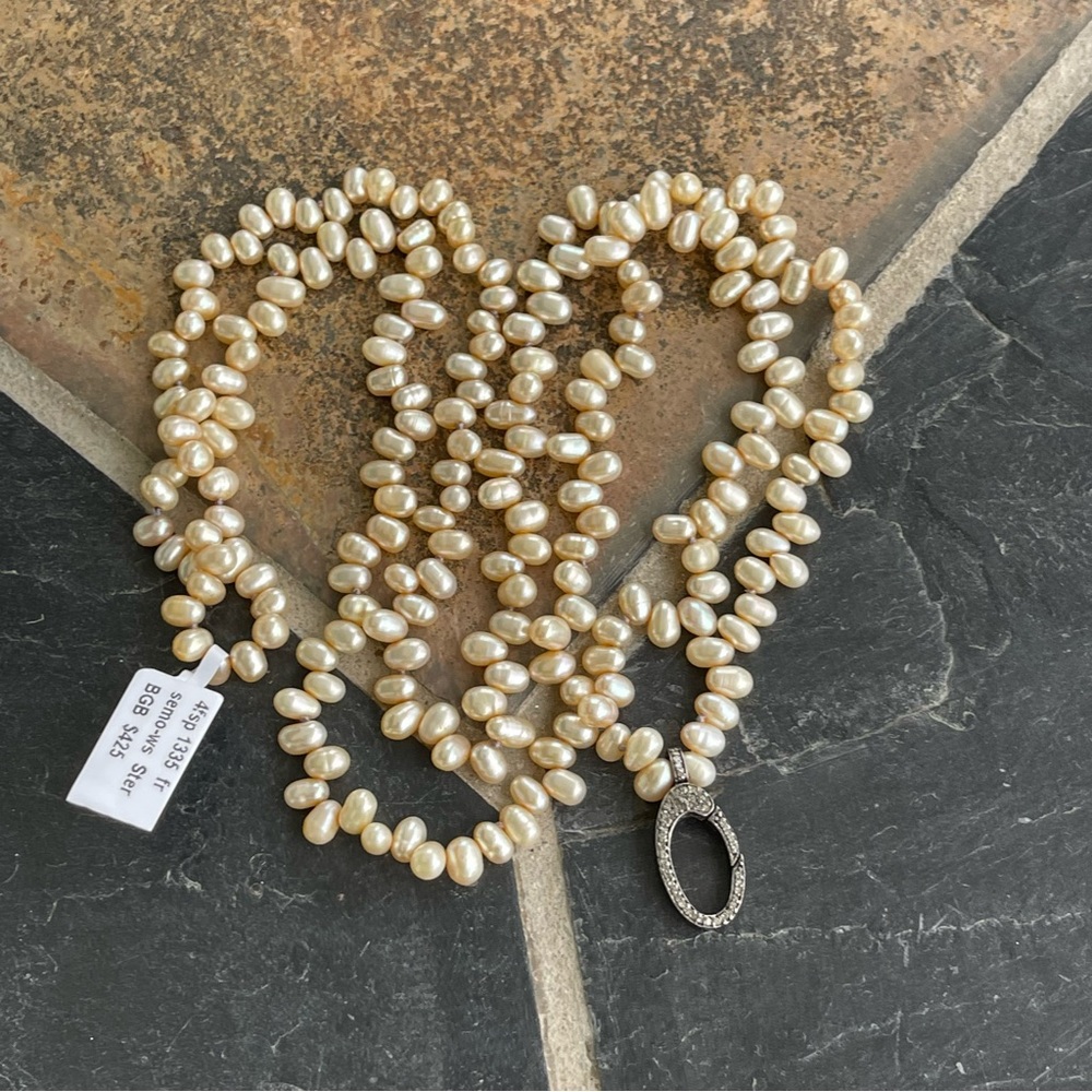 Elegant one of a kind Pearl Necklace with Silver diamond Clasp 30” long